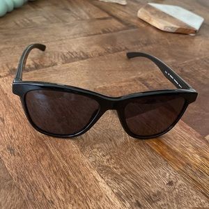 Oakley women’s sunglasses, never works, with pouch for carrying.